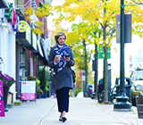 Person walking the street of downtown Oakville, Ontario