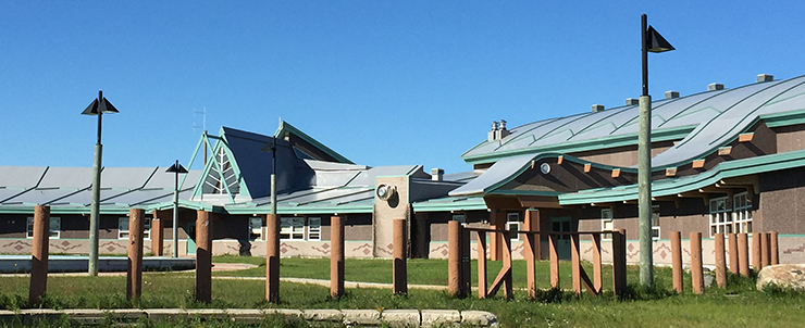 The Peetabeck Academy in the Fort Albany First Nation, with a goose head decorating the main entrance. The community is a recent ECB program participant.